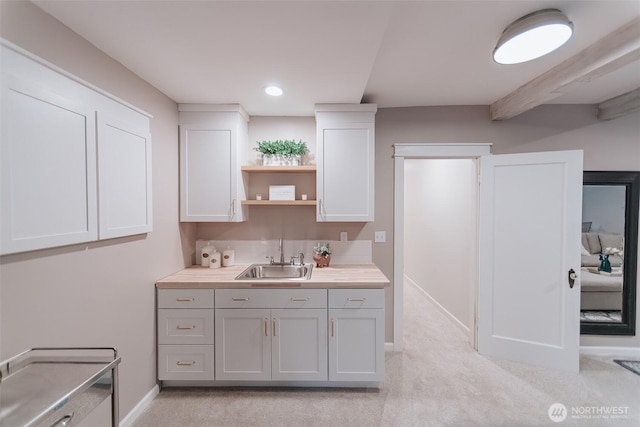 1325 SW 120th St, Burien, WA 98146 - kitchen with light countertops, light carpet, gray cabinetry, open shelves, and white cabinetry