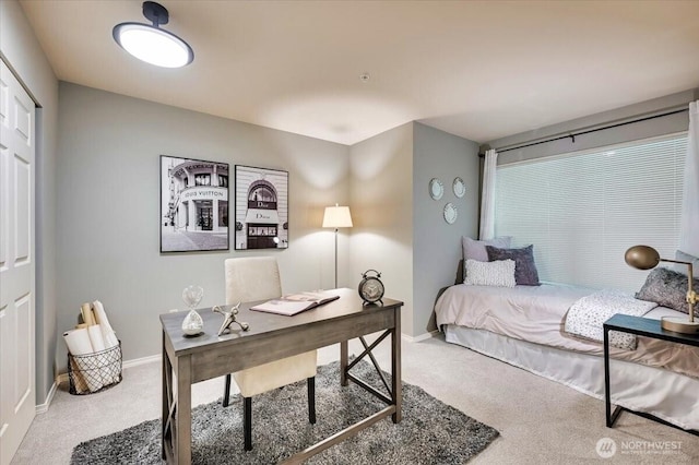2001 120th Pl SE Unit 3-104, Everett, WA 98208 - carpeted bedroom featuring baseboards and a desk