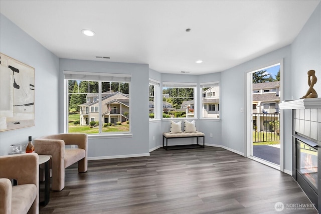 4714 Fairwood Blvd NE Unit 1301, Tacoma, WA 98422 - sitting room featuring a tiled fireplace, wood finished floors, and recessed lighting