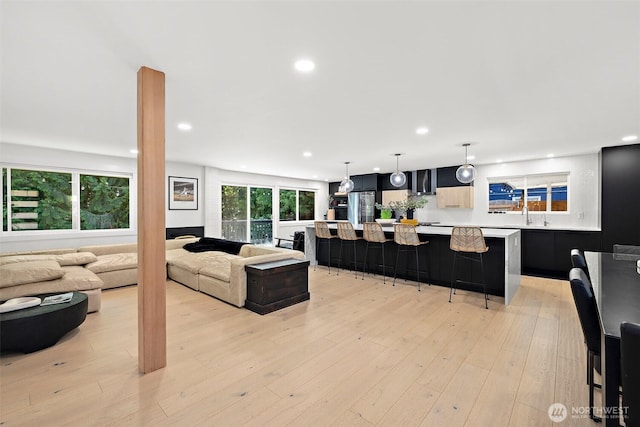 11171 SE 59th St, Bellevue, WA 98006 - living room with recessed lighting and light wood-style flooring