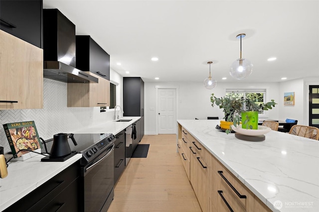 11171 SE 59th St, Bellevue, WA 98006 - kitchen with wall chimney exhaust hood, dark cabinets, modern cabinets, and recessed lighting