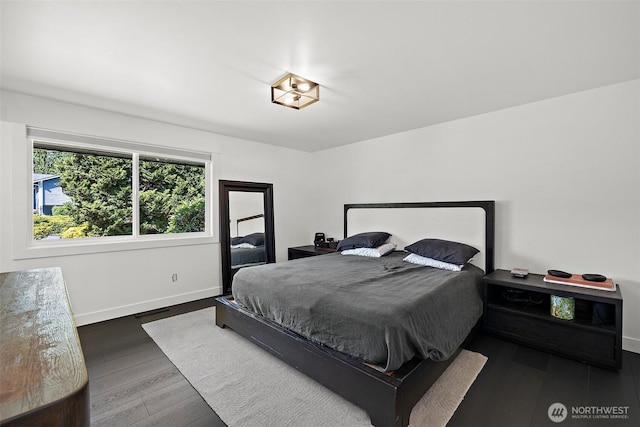 11171 SE 59th St, Bellevue, WA 98006 - bedroom featuring dark wood-style floors and baseboards