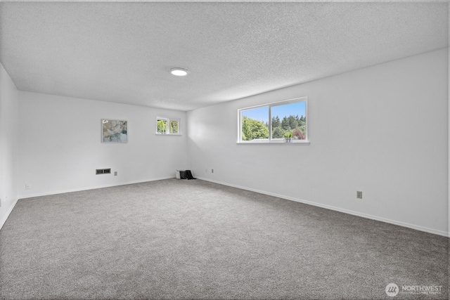 4036 Debbie Ct SE, Olympia, WA 98501 - unfurnished room featuring a textured ceiling and carpet