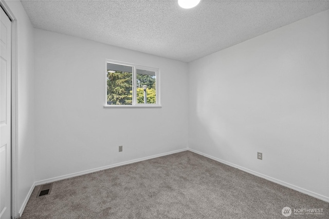 4036 Debbie Ct SE, Olympia, WA 98501 - unfurnished room featuring a textured ceiling and carpet floors