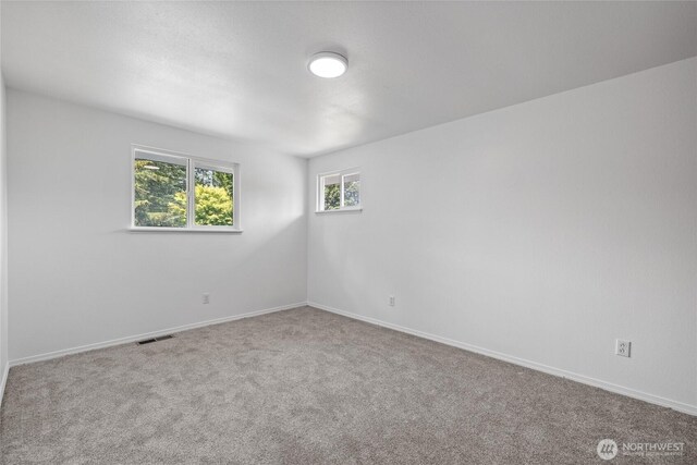 4036 Debbie Ct SE, Olympia, WA 98501 - unfurnished room featuring carpet floors and baseboards