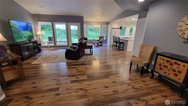 1225 98th Ln SE, Olympia, WA 98501 - living area with lofted ceiling, dark wood-type flooring, a chandelier, and recessed lighting