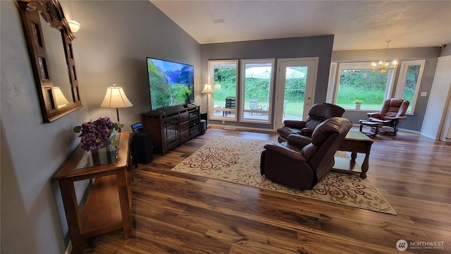 1225 98th Ln SE, Olympia, WA 98501 - living area featuring dark wood-type flooring, vaulted ceiling, and a chandelier