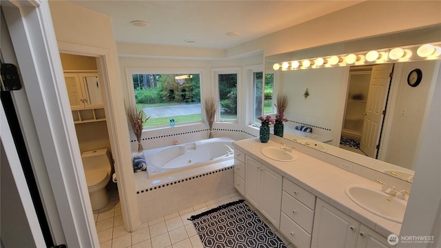 1225 98th Ln SE, Olympia, WA 98501 - bathroom featuring a whirlpool tub, tile patterned floors, and double vanity