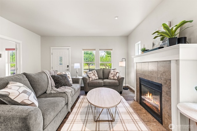 5611 Balustrade Blvd SE, Lacey, WA 98513 - living area featuring a tile fireplace, wood finished floors, and recessed lighting
