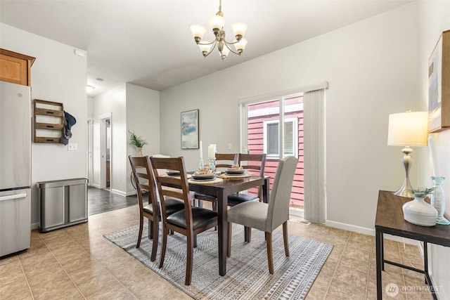 5611 Balustrade Blvd SE, Lacey, WA 98513 - dining area featuring a chandelier and light tile patterned floors