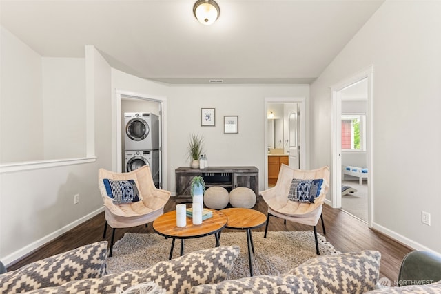 5611 Balustrade Blvd SE, Lacey, WA 98513 - sitting room with stacked washer / drying machine and wood finished floors
