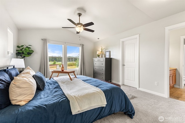 5611 Balustrade Blvd SE, Lacey, WA 98513 - bedroom with vaulted ceiling, carpet, ensuite bathroom, and ceiling fan