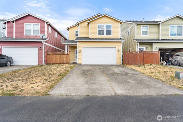5611 Balustrade Blvd SE, Lacey, WA 98513 - traditional home featuring an attached garage and concrete driveway