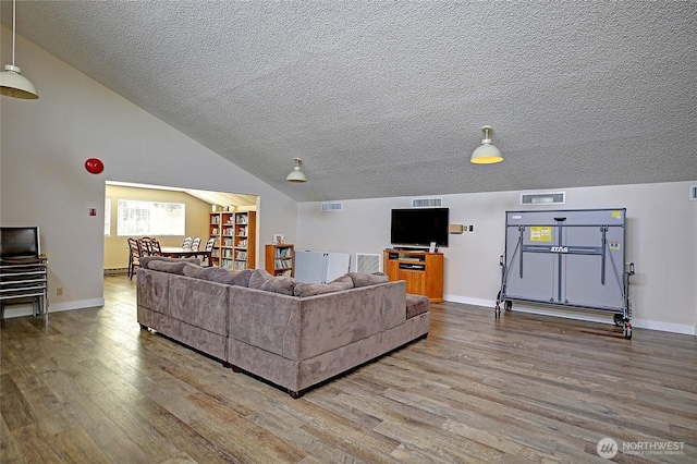 1985 Elhardt St, Camano Island, WA 98282 - living room featuring wood finished floors and a textured ceiling