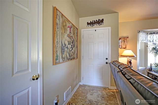 1985 Elhardt St, Camano Island, WA 98282 - foyer entrance featuring baseboards and stone finish flooring