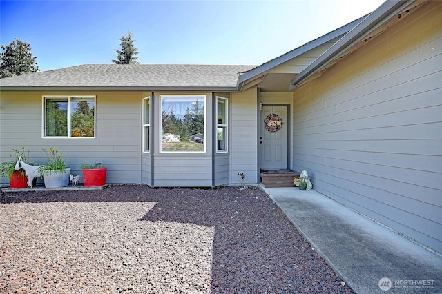 1985 Elhardt St, Camano Island, WA 98282 - doorway to property featuring a shingled roof