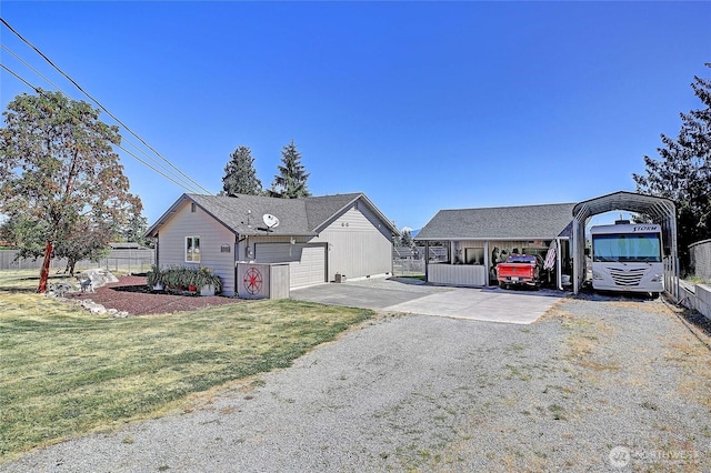 1985 Elhardt St, Camano Island, WA 98282 - view of front of property featuring driveway, a carport, and a garage