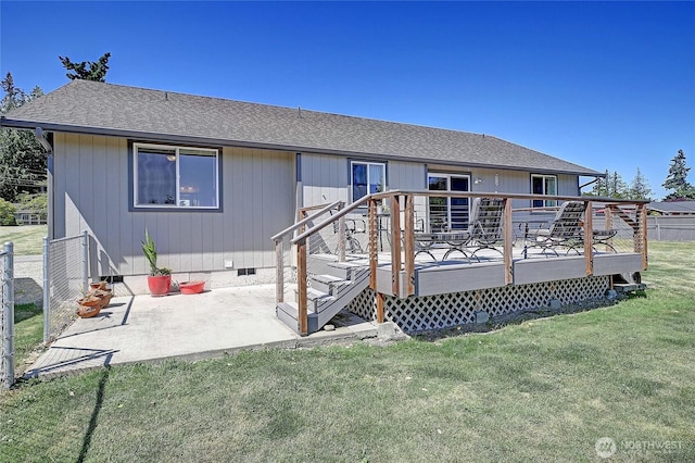 1985 Elhardt St, Camano Island, WA 98282 - rear view of house featuring crawl space, roof with shingles, a patio, a lawn, and a wooden deck