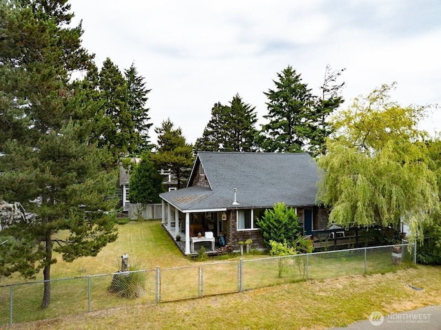 218 SW 15th St, Long Beach, WA 98631 - view of front of home featuring a fenced backyard and a shingled roof