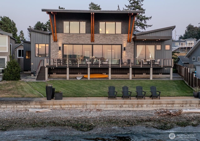 181 Utsalady Rd, Camano Island, WA 98282 - back of house featuring stone siding and a deck