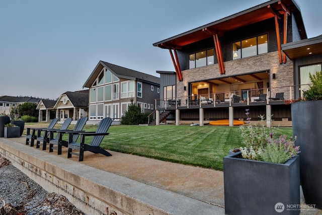 181 Utsalady Rd, Camano Island, WA 98282 - rear view of property featuring a yard, stone siding, a residential view, and stairway