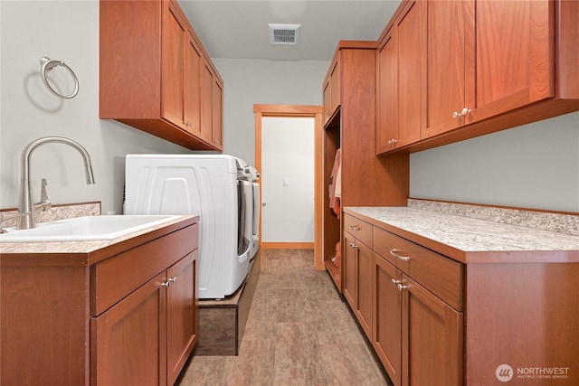 229 Chuckanut Point Rd, Bellingham, WA 98229 - laundry area featuring washer / clothes dryer and cabinet space