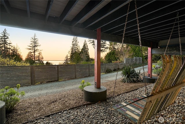 229 Chuckanut Point Rd, Bellingham, WA 98229 - patio terrace at dusk featuring a fenced backyard
