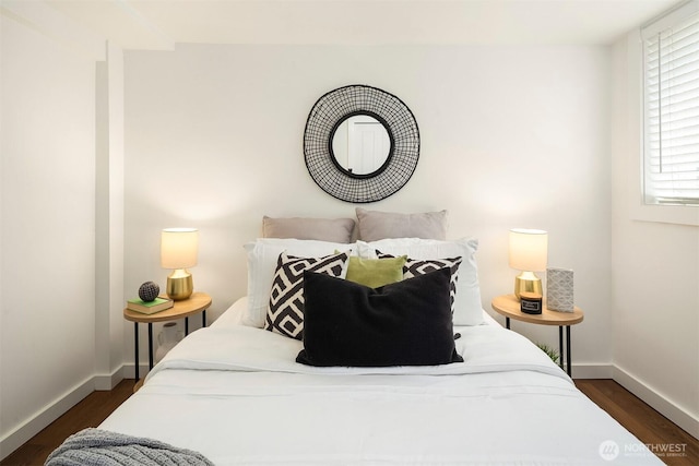 9013 16th Ave SW Unit 11, Seattle, WA 98106 - bedroom with baseboards and dark wood finished floors