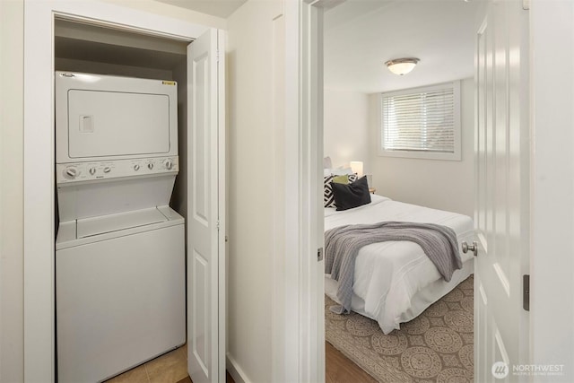 9013 16th Ave SW Unit 11, Seattle, WA 98106 - bedroom with stacked washing machine and dryer