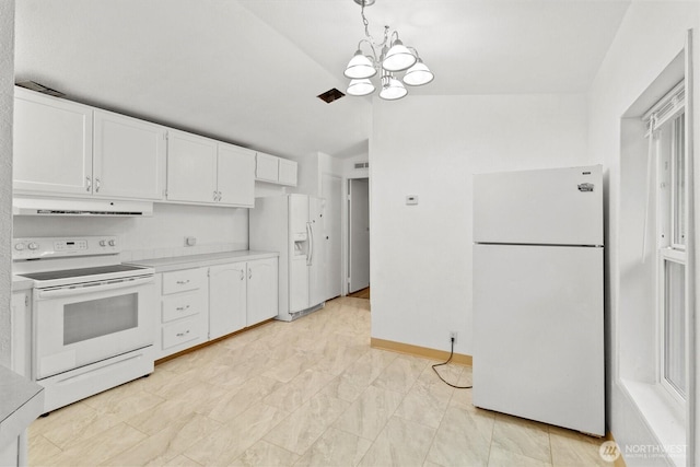 8363 Holly Ln, Maple Falls, WA 98266 - kitchen with white appliances, range hood, white cabinetry, a chandelier, and light countertops