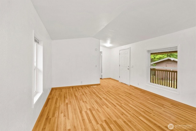8363 Holly Ln, Maple Falls, WA 98266 - spare room featuring light wood-style floors and lofted ceiling