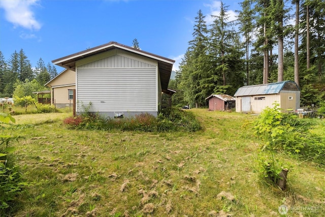 8363 Holly Ln, Maple Falls, WA 98266 - view of property exterior featuring a storage shed and crawl space
