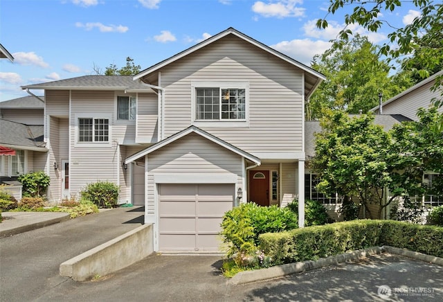 8629 240th St SW Unit B4, Edmonds, WA 98026 - view of front of home featuring asphalt driveway and an attached garage
