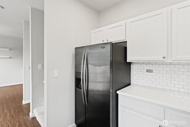 8629 240th St SW Unit B4, Edmonds, WA 98026 - kitchen with stainless steel refrigerator with ice dispenser, tasteful backsplash, dark wood-style flooring, and white cabinets