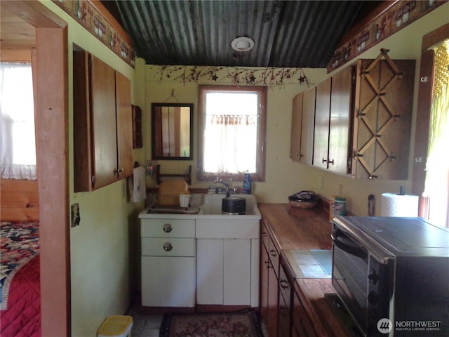 270 W Fork Rd, Conconully, WA 98819 - kitchen with white cabinets and a sink