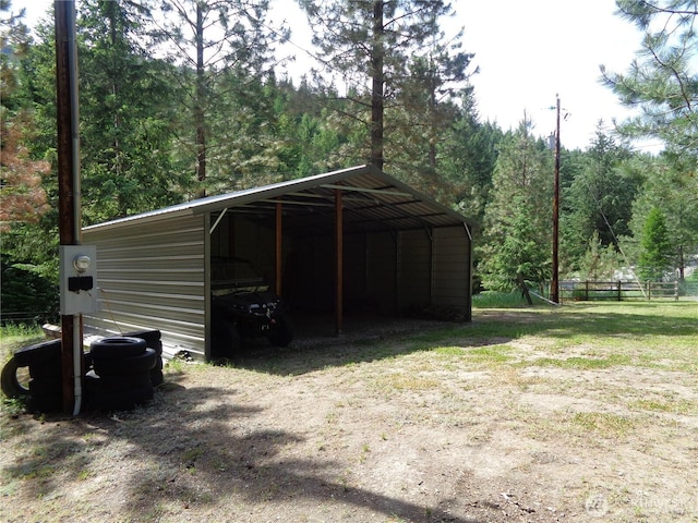 270 W Fork Rd, Conconully, WA 98819 - view of outdoor structure featuring a carport and driveway
