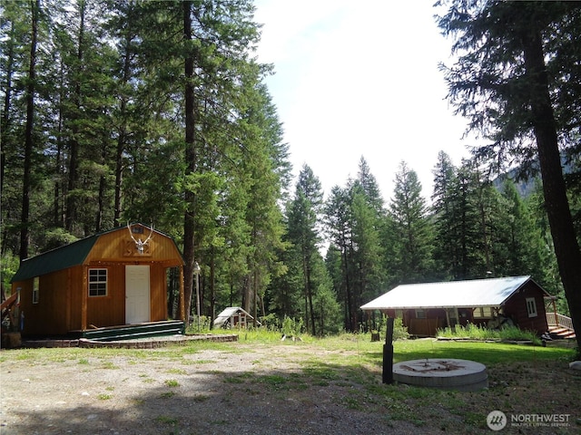 270 W Fork Rd, Conconully, WA 98819 - view of yard with a forest view and a shed