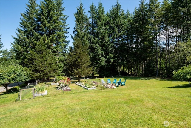30 E Richardson Rd, Belfair, WA 98528 - view of green lawn featuring a garden