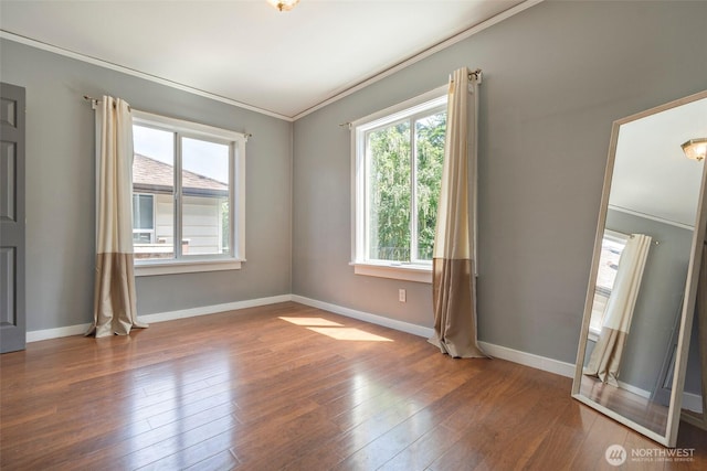 5253 35th Ave SW, Seattle, WA 98126 - empty room with crown molding and wood finished floors