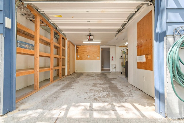 5253 35th Ave SW, Seattle, WA 98126 - garage featuring a garage door opener