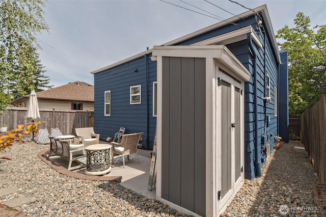 5253 35th Ave SW, Seattle, WA 98126 - view of outbuilding with a fenced backyard