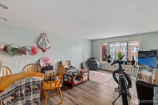 25 N Broadway Unit 207, Tacoma, WA 98403 - dining area featuring wood finished floors and baseboards