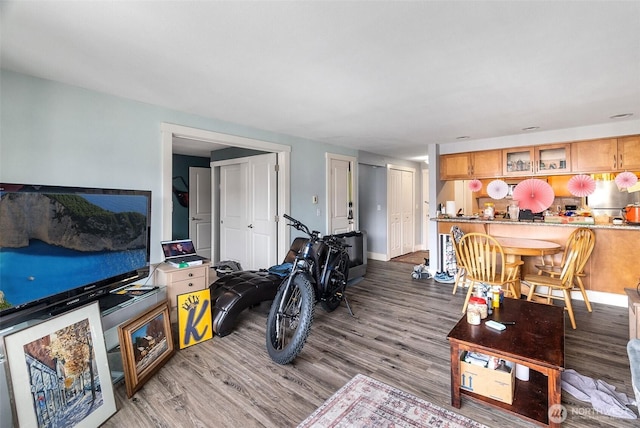 25 N Broadway Unit 207, Tacoma, WA 98403 - living room with wood finished floors and baseboards