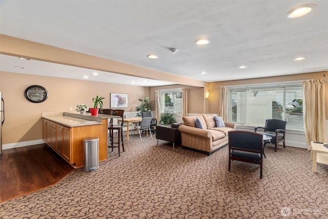 25 N Broadway Unit 207, Tacoma, WA 98403 - living room featuring baseboards and recessed lighting