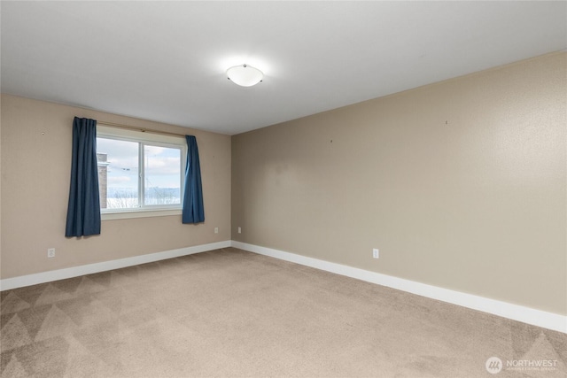 25 N Broadway Unit 207, Tacoma, WA 98403 - spare room with light carpet and baseboards