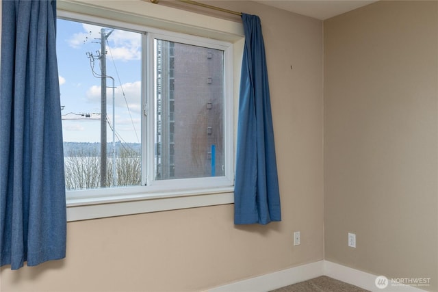 25 N Broadway Unit 207, Tacoma, WA 98403 - carpeted empty room with plenty of natural light