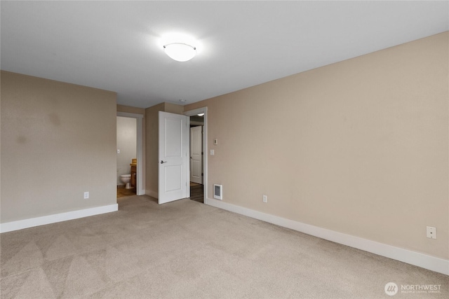 25 N Broadway Unit 207, Tacoma, WA 98403 - unfurnished bedroom with carpet floors and ensuite bath