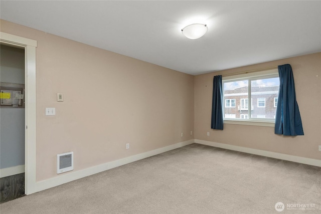 25 N Broadway Unit 207, Tacoma, WA 98403 - empty room featuring carpet floors and baseboards