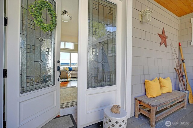 656 Lehman Dr, Camano Island, WA 98282 - doorway to property with a porch