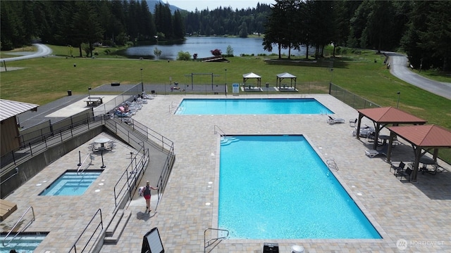 44664 Similk Trl, Concrete, WA 98237 - community pool featuring a forest view, a water view, and a patio area